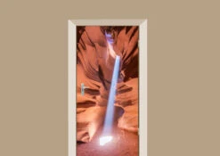 Deursticker Zonnestraal Door De Grand Canyon